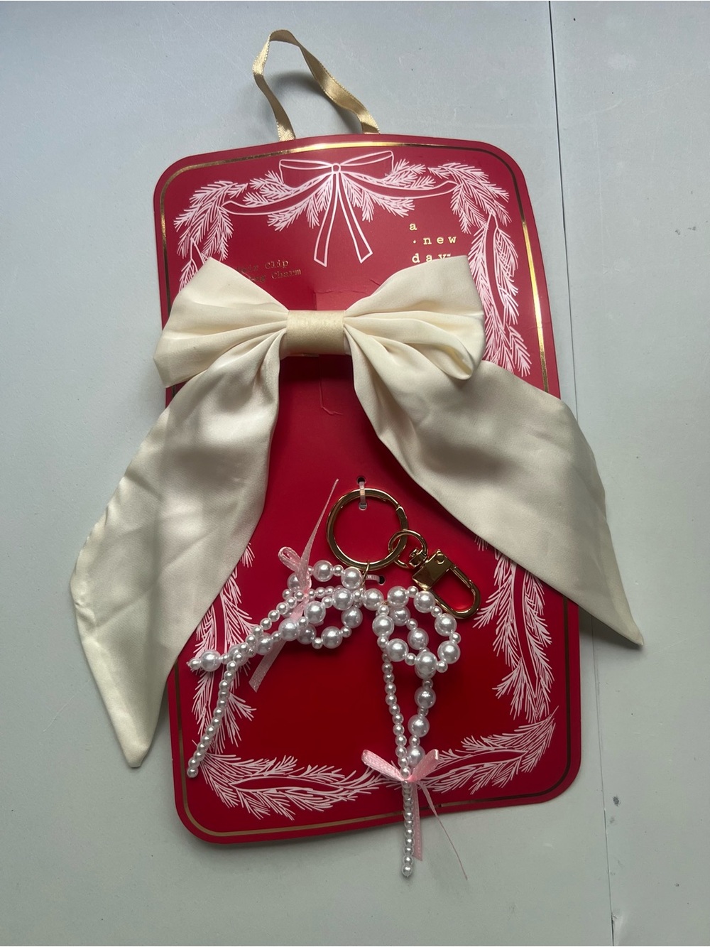a new day Ivory Satin Bow Keychain with Pearl Charm and Gold Hardware